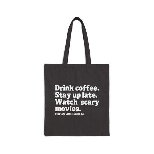 "Drink coffee. Stay up late. Watch scary movies." Black Canvas Tote Bag